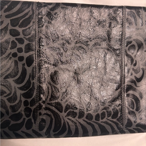 Hand painted one of a long grey and black clutch purse.